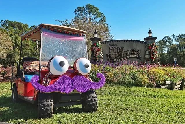 Zerble parked in front of the Fort Wilderness Resort and Campground sign at Walt Disney World.