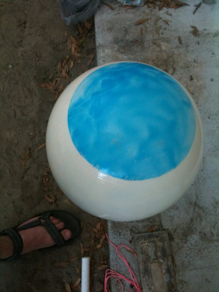 The first Zerble eyeball: a big bouncy ball primed white, with its marbled blue iris left showing.