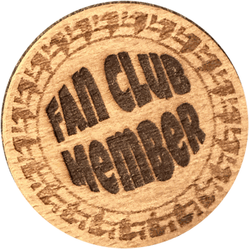 The back of the wooden token, engraved FAN CLUB MEMBER inside a decorative border.